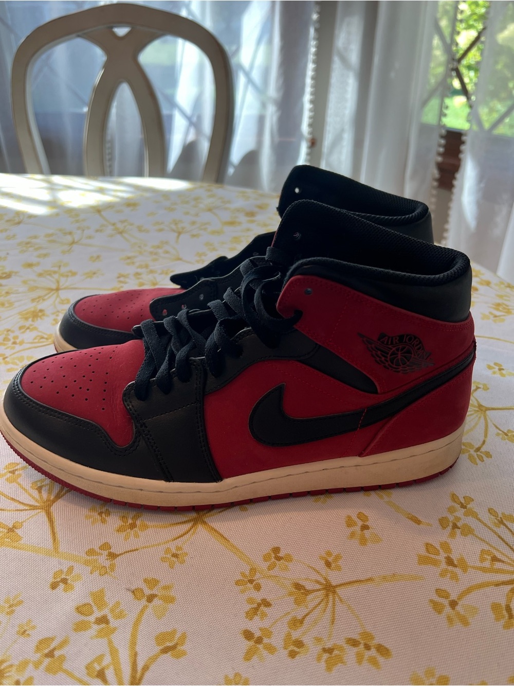 Men's 10.5 Nike Air Jordan "mid" high top sneakers red and black